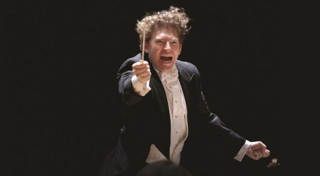 Dirijorul Philip Mann și pianista Dana Borșan, pe scena Sălii Radio