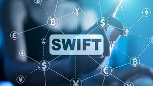 80ee2419-6213-4a22-98be-b4fbcc1e5d24-300x169 SWIFT, Society for Worldwide Interbank Financial Telecommunications, online payment and financial regulation concept.