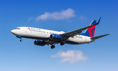 aterizare urgenta, avion Delta, fum cabină, pasageri spital, porto